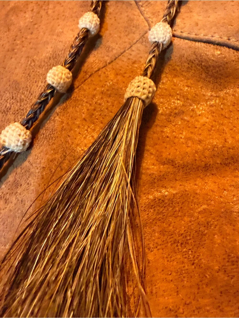 Vintage Western Bolo Tie pewter a saddle Horsehair and Barrel beads Lrg.